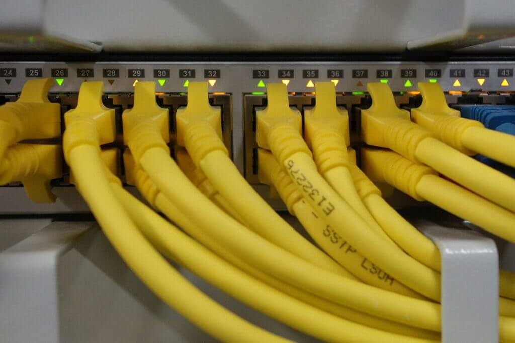 yellow network cables with a switch