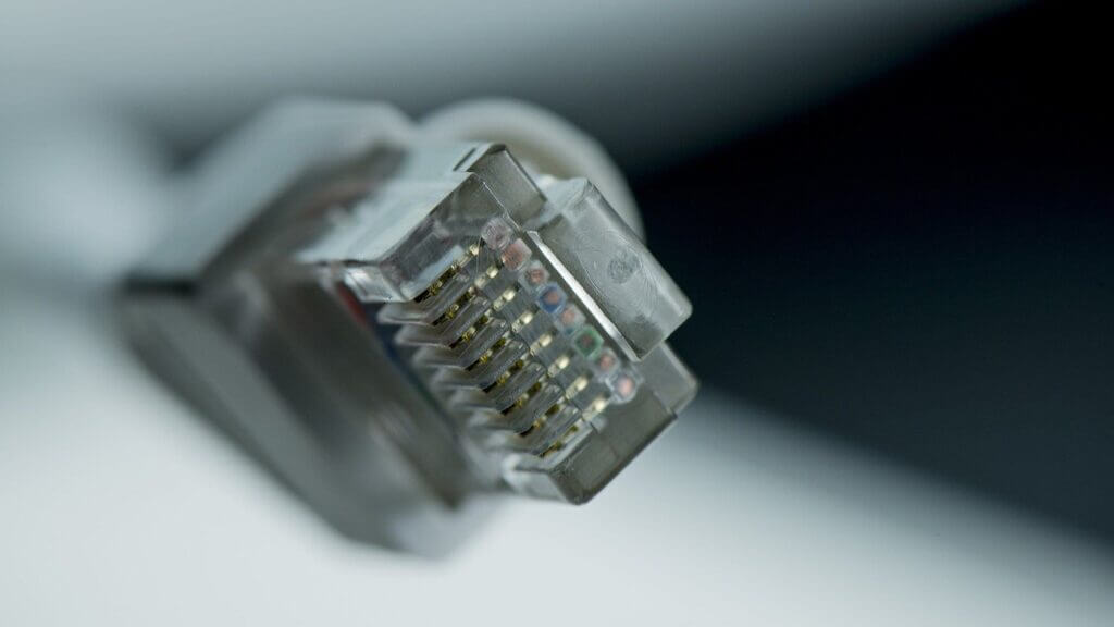 Photo of a gray ethernet cable close up