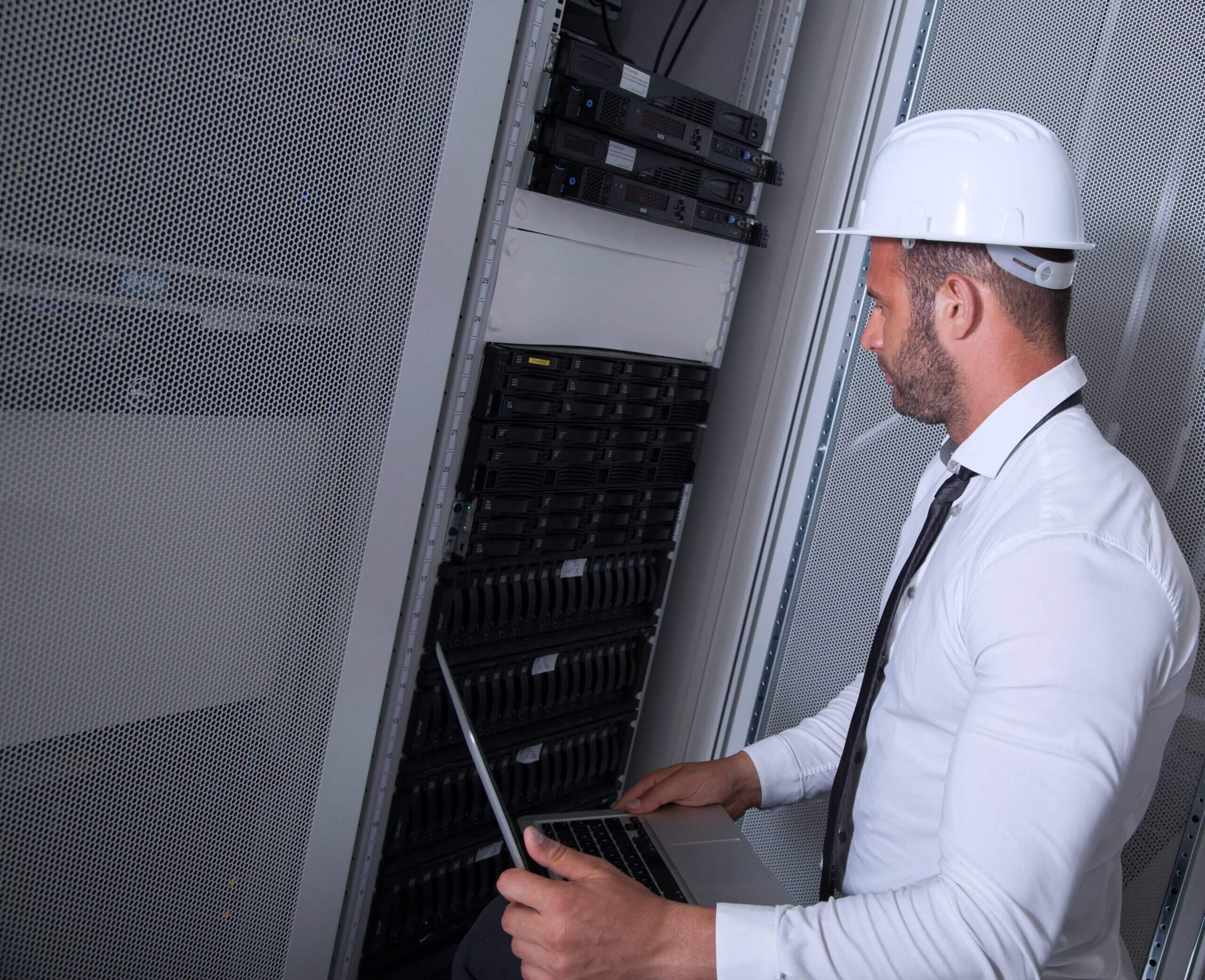 professional site surveyor performing an active site survey in a server room