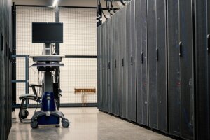 Server room with a chair and diagnostic computer